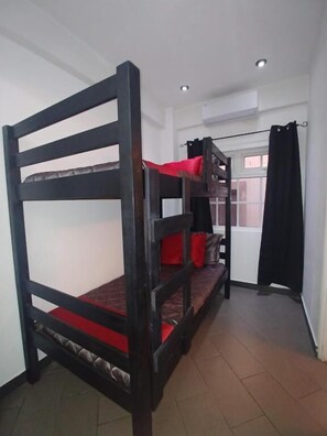 Blackout curtains, iron/ironing board, free WiFi, bed sheets