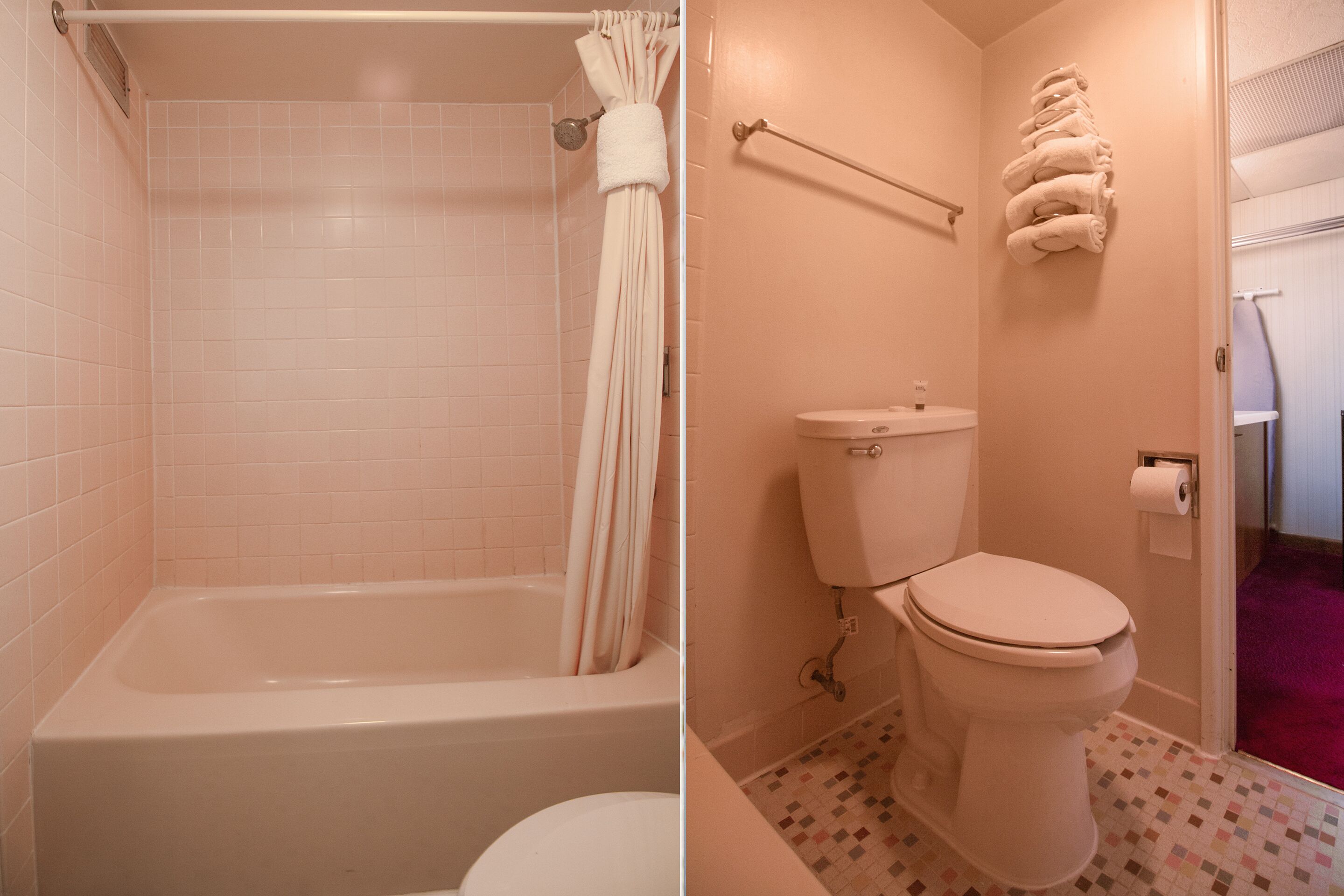 A bathroom with a bathtub, toilet, and a towel rack.