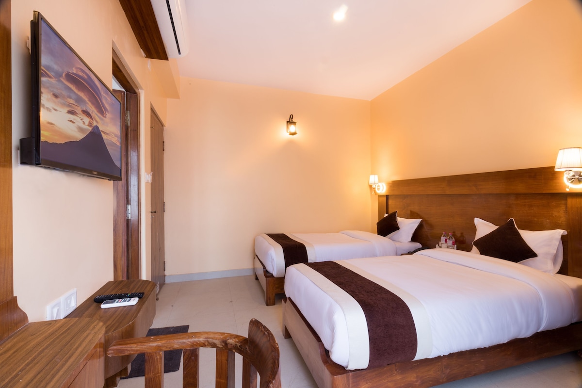 Premium bedding, down comforters, laptop workspace, blackout drapes