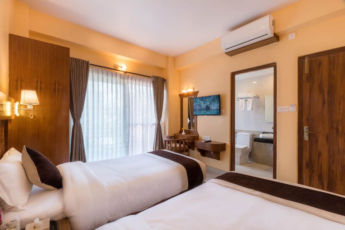 Premium bedding, down duvets, laptop workspace, blackout curtains