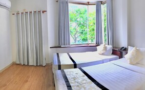 Ropa de cama de alta calidad, minibar, caja fuerte y cortinas opacas