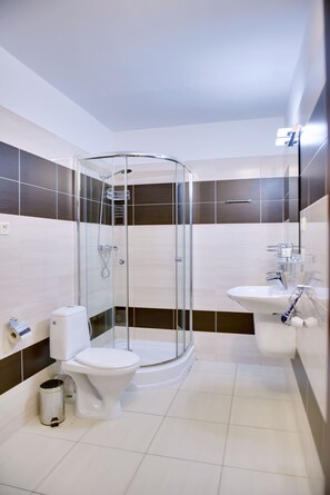 Shower, free toiletries, hair dryer, towels