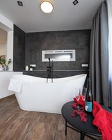 Deluxe Double Room | Bathroom | Shower, hair dryer, towels, soap