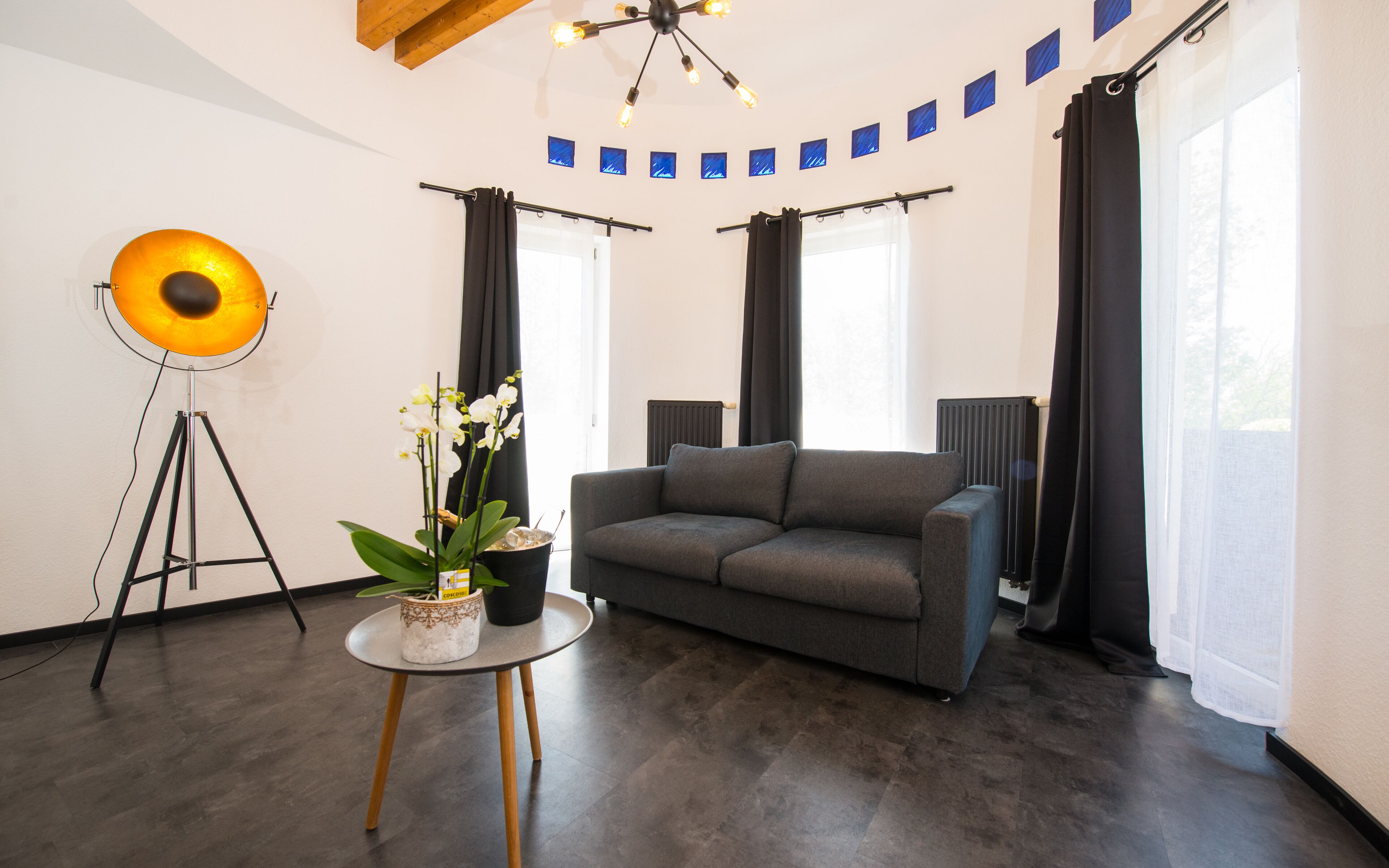 junior suite | living area | 28-inch flat-screen tv with cable channels, tv, toys