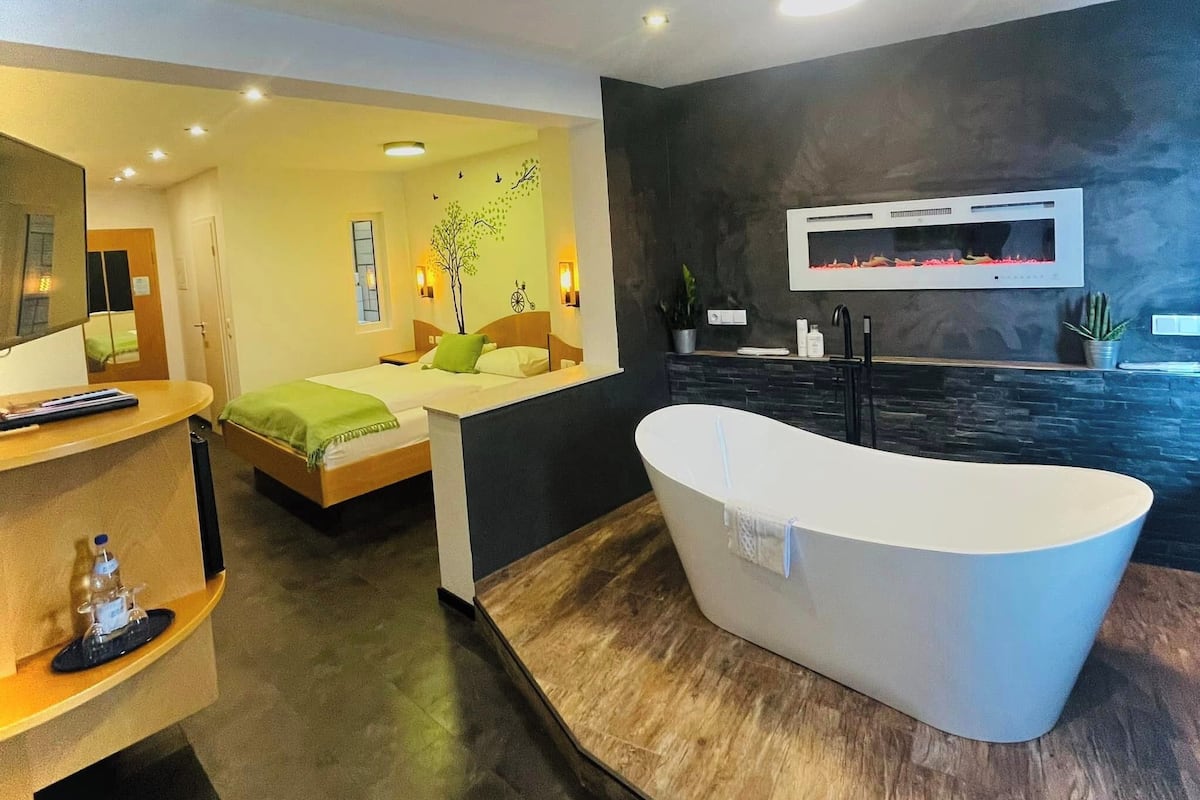 junior suite | living area | 28-inch flat-screen tv with cable channels, tv, toys