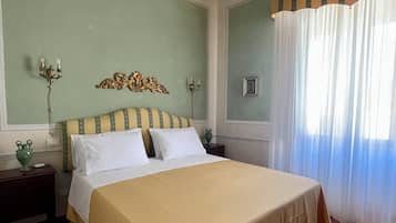 Junior Room | 1 bedroom, minibar, in-room safe, individually decorated