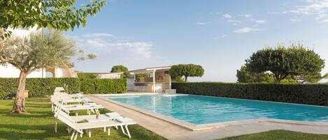 Seasonal outdoor pool, sun loungers