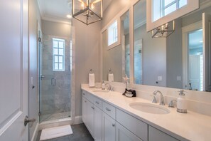 Shower, hair dryer, towels, soap