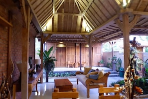 Villa, 2 Bedrooms, Garden Area | Living area | Flat-screen TV - Apple Resort Retreat Spa (Tabanan)