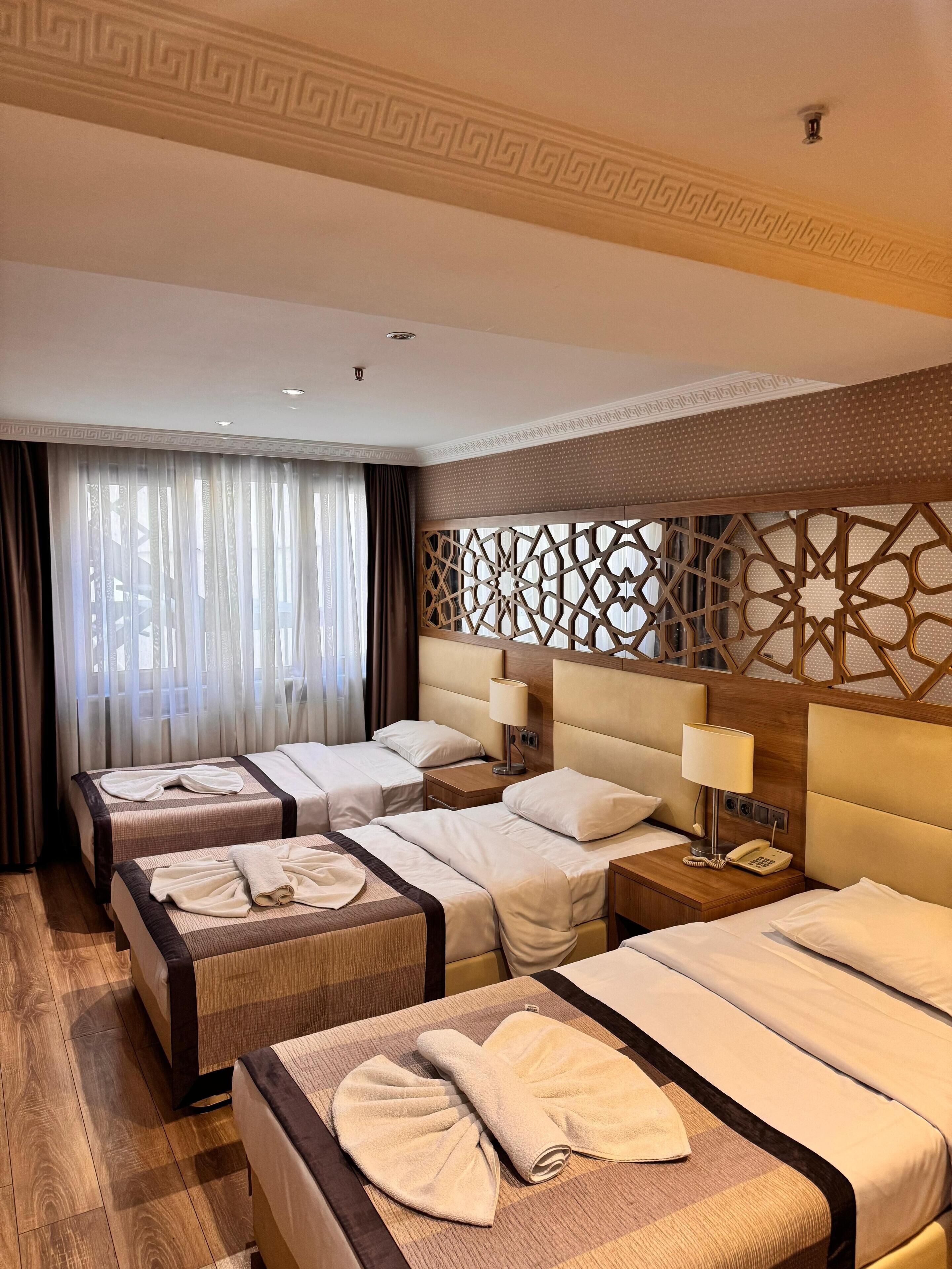 Standard Triple Room | Minibar, in-room safe, soundproofing, free WiFi