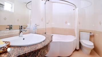 Standard Double Room, 1 Queen Bed, City View | Bathroom | Combined shower/bathtub, free toiletries, hair dryer, slippers