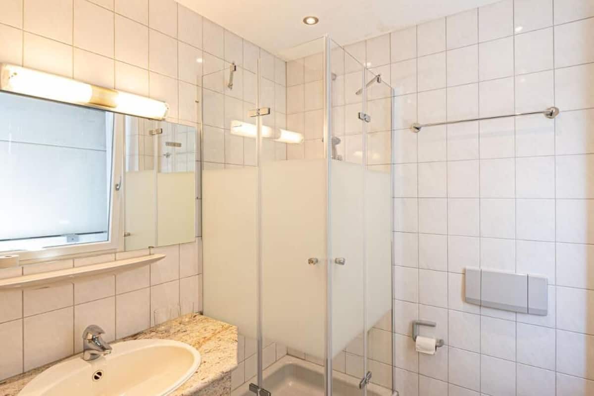 comfort double room | bathroom | shower, free toiletries, hair dryer, towels
