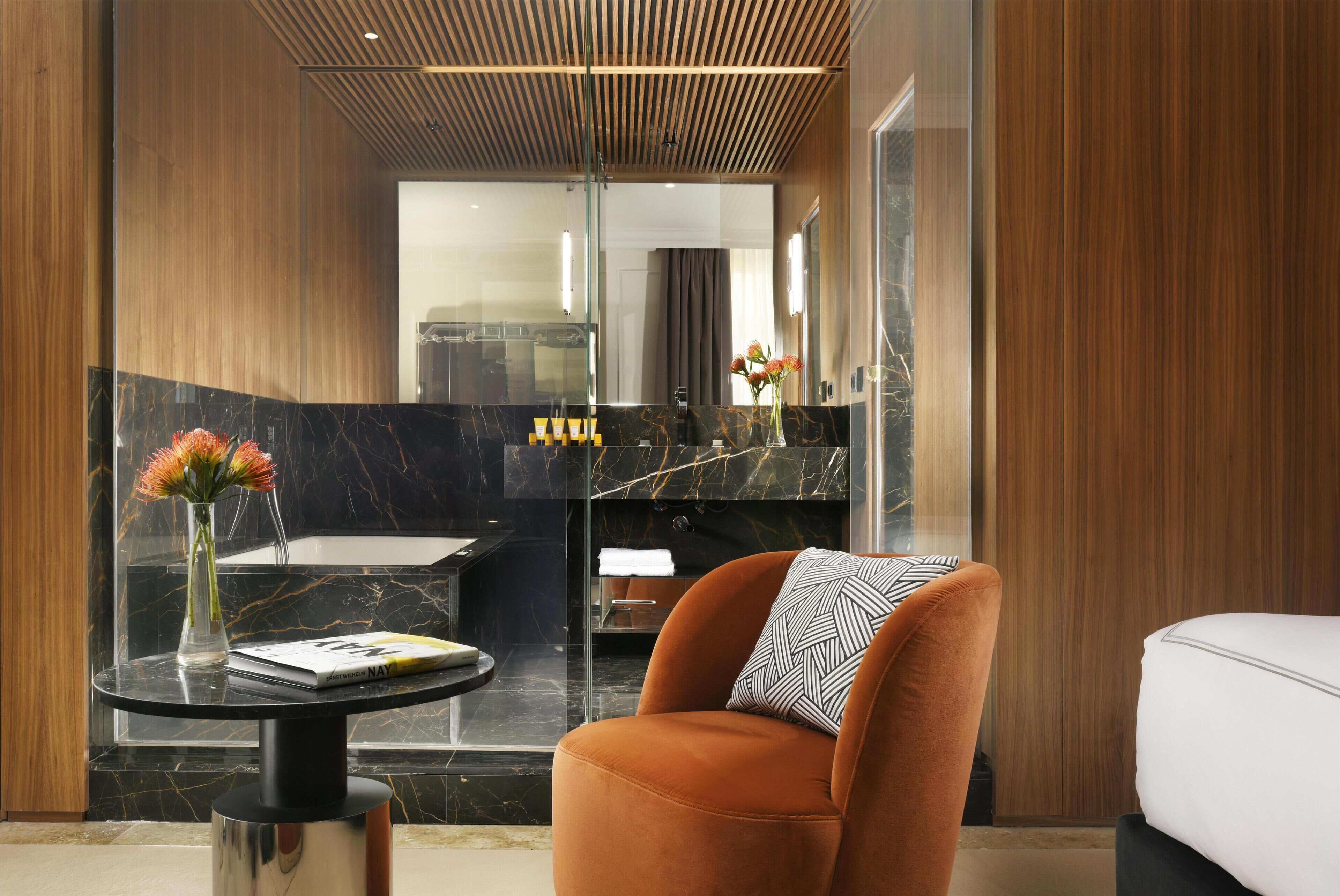 Designer toiletries, hair dryer, bathrobes, slippers