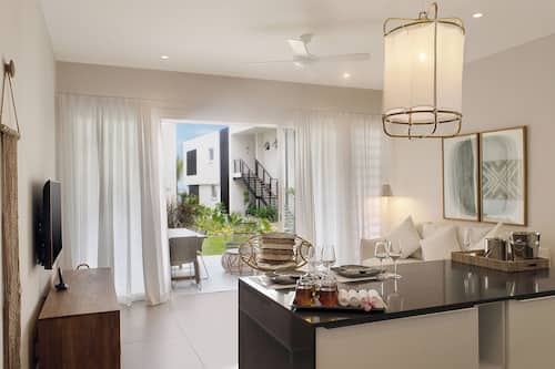 Deluxe Apartment, 2 Bedrooms | Living area | 32-inch flat-screen TV with cable channels, TV