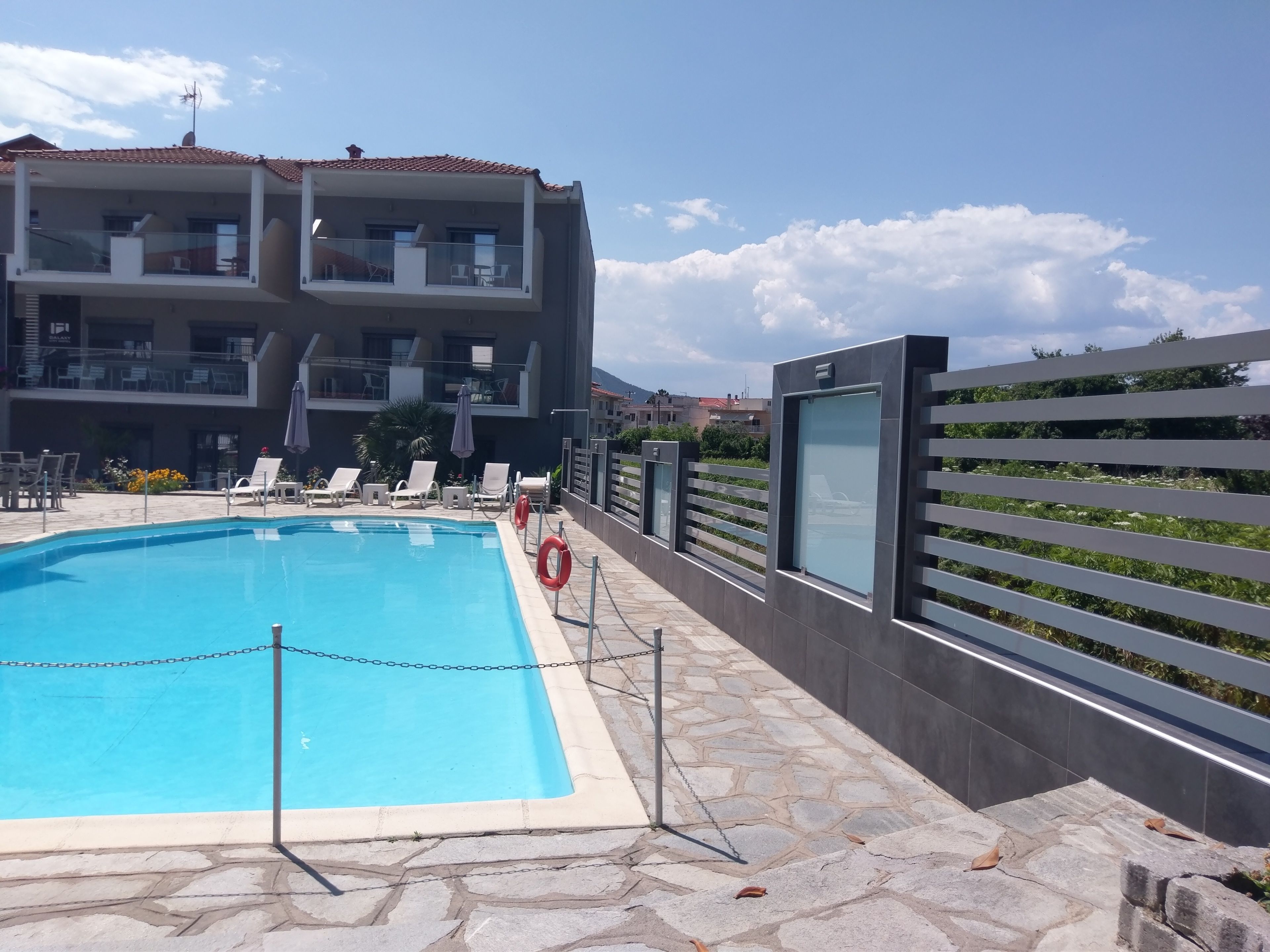 Seasonal outdoor pool, pool umbrellas, sun loungers