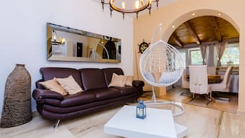 One bedroom apartment with patio | Living room | 25-inch flat-screen TV with digital channels, TV, DVD player