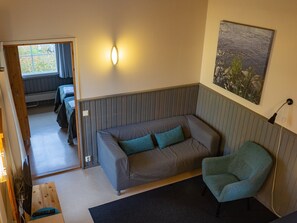 Standard Cabin, 1 Bedroom | Living area | Flat-screen TV - Nallikari Seaside Cottages (Oulu)