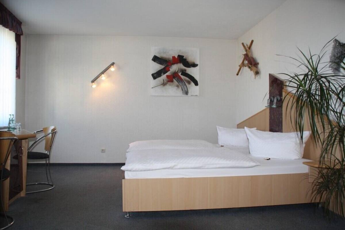 Double or Twin Room | Desk, blackout drapes, rollaway beds, free WiFi