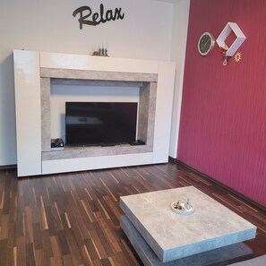 เอ็กซ์คลูซีฟดูเพล็กซ์, 2 ห้องนอน, ปลอดบุหรี่, 2 ห้องน้ำ | บริเวณนั่งเล่น | ทีวีจอแบน, เครื่องเล่นดีวีดี