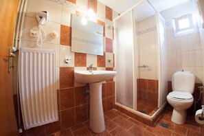 Dutxa, assecador de cabells i tovalloles 