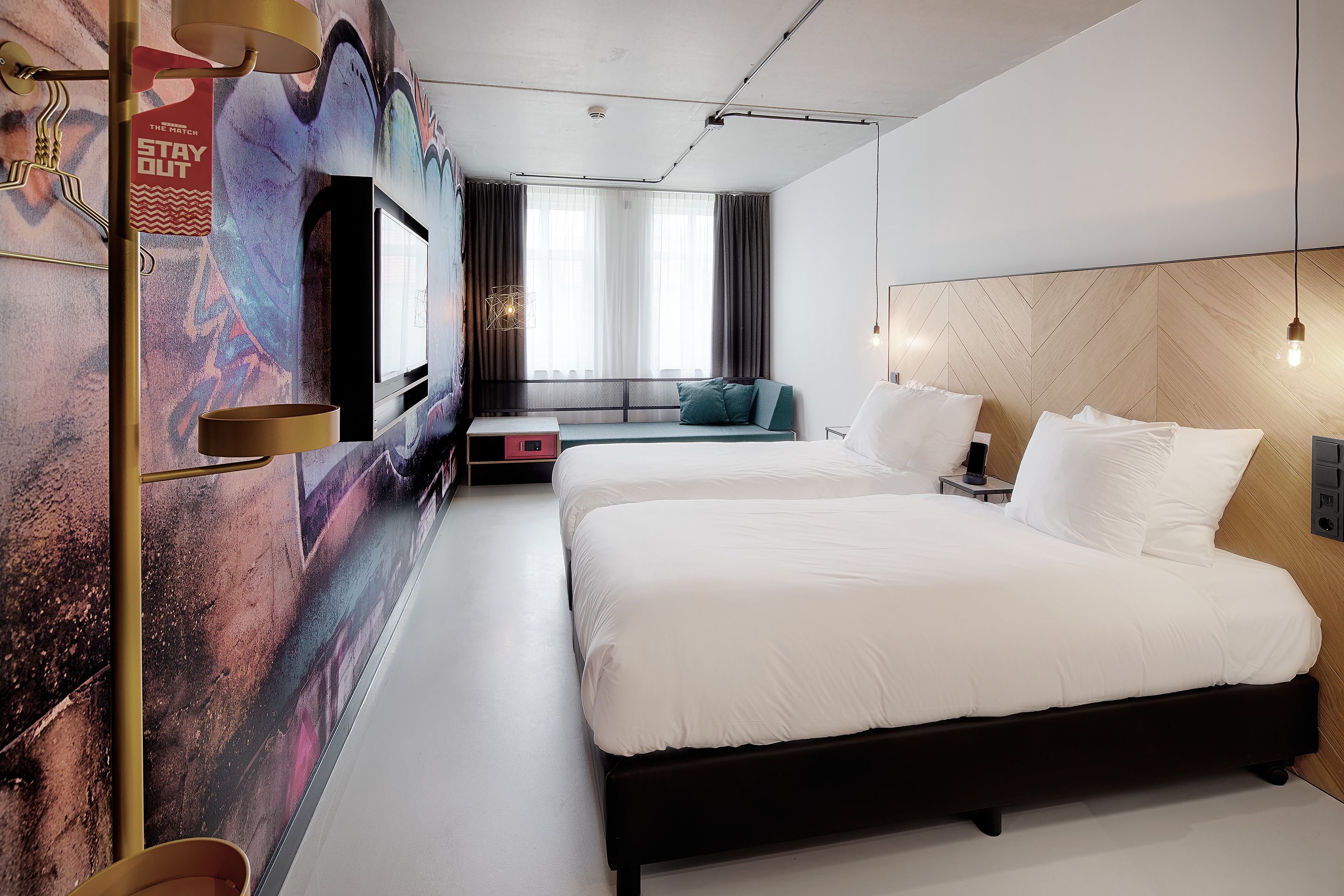 comfort twin room | hypo-allergenic bedding, down duvets, memory-foam beds, in-room safe