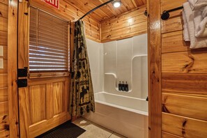 Combined shower/tub, hair dryer, towels, soap