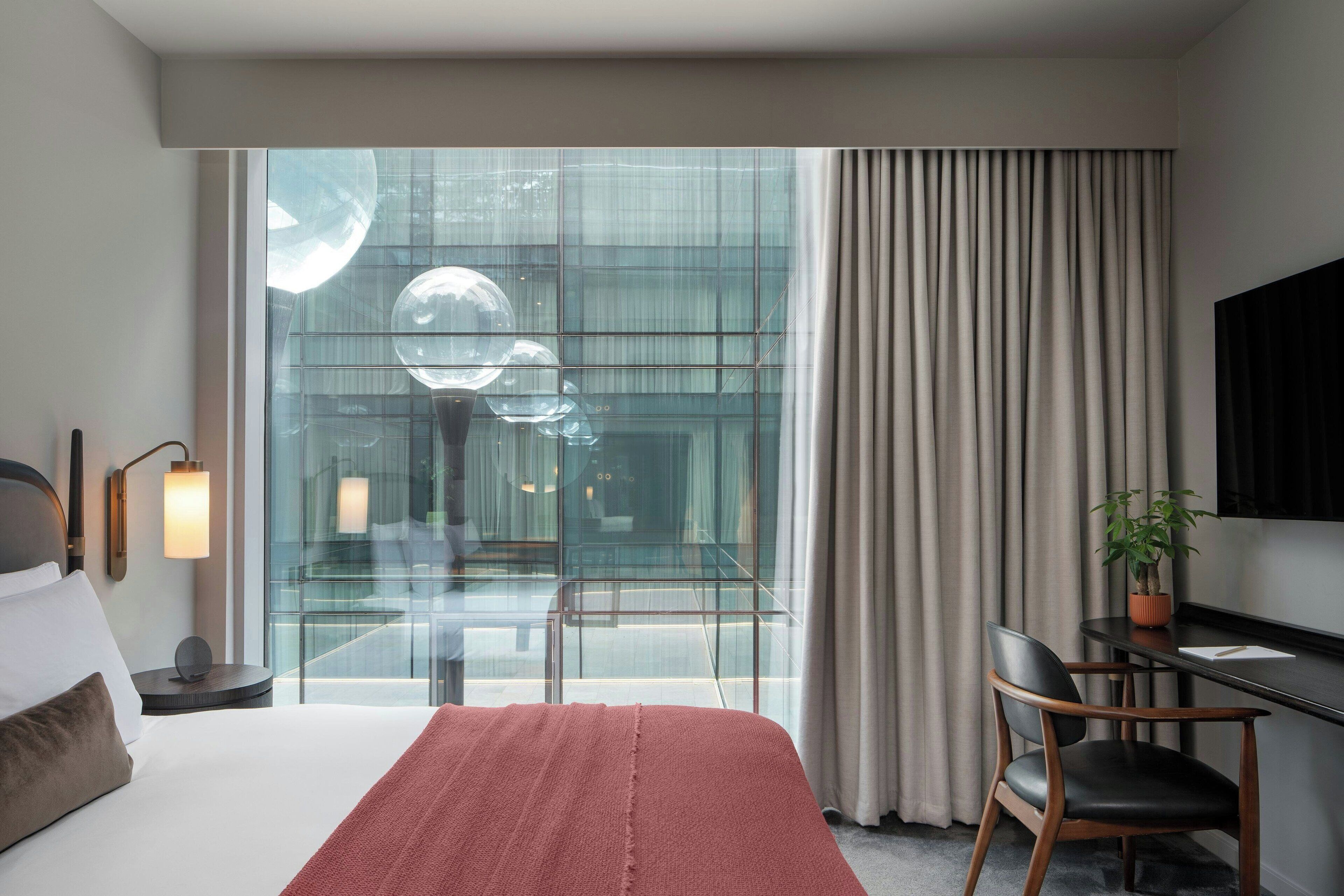 egyptian cotton sheets, premium bedding, down duvets, in-room safe