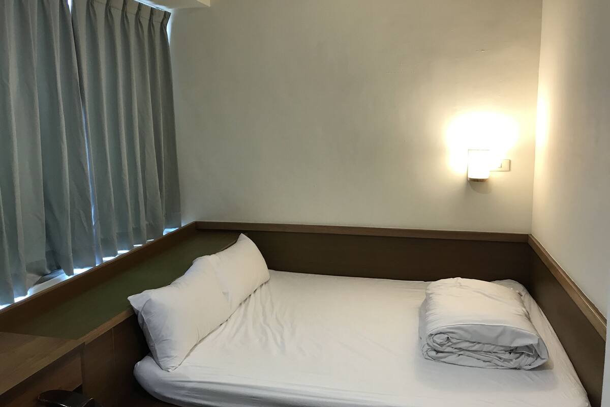 Blackout curtains, free WiFi, bed sheets