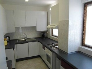Apartment, 3 Bedrooms, Terrace, Partial Sea View | Private kitchen | Fridge, microwave, oven, stovetop