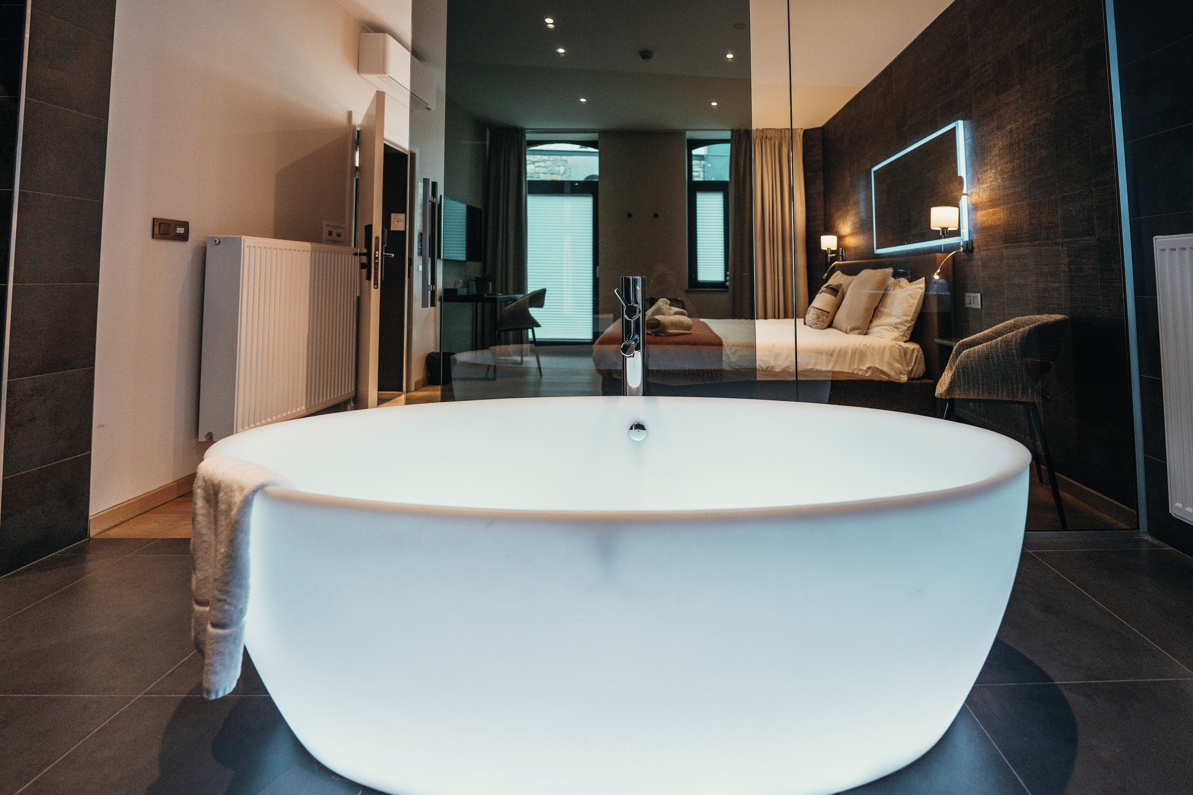 Suite | Premium bedding, memory-foam beds, desk, blackout curtains