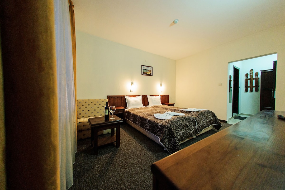 Standard Double Room | Minibar, desk, iron/ironing board, free cots/infant beds