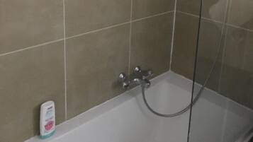 Shower, free toiletries, towels, soap