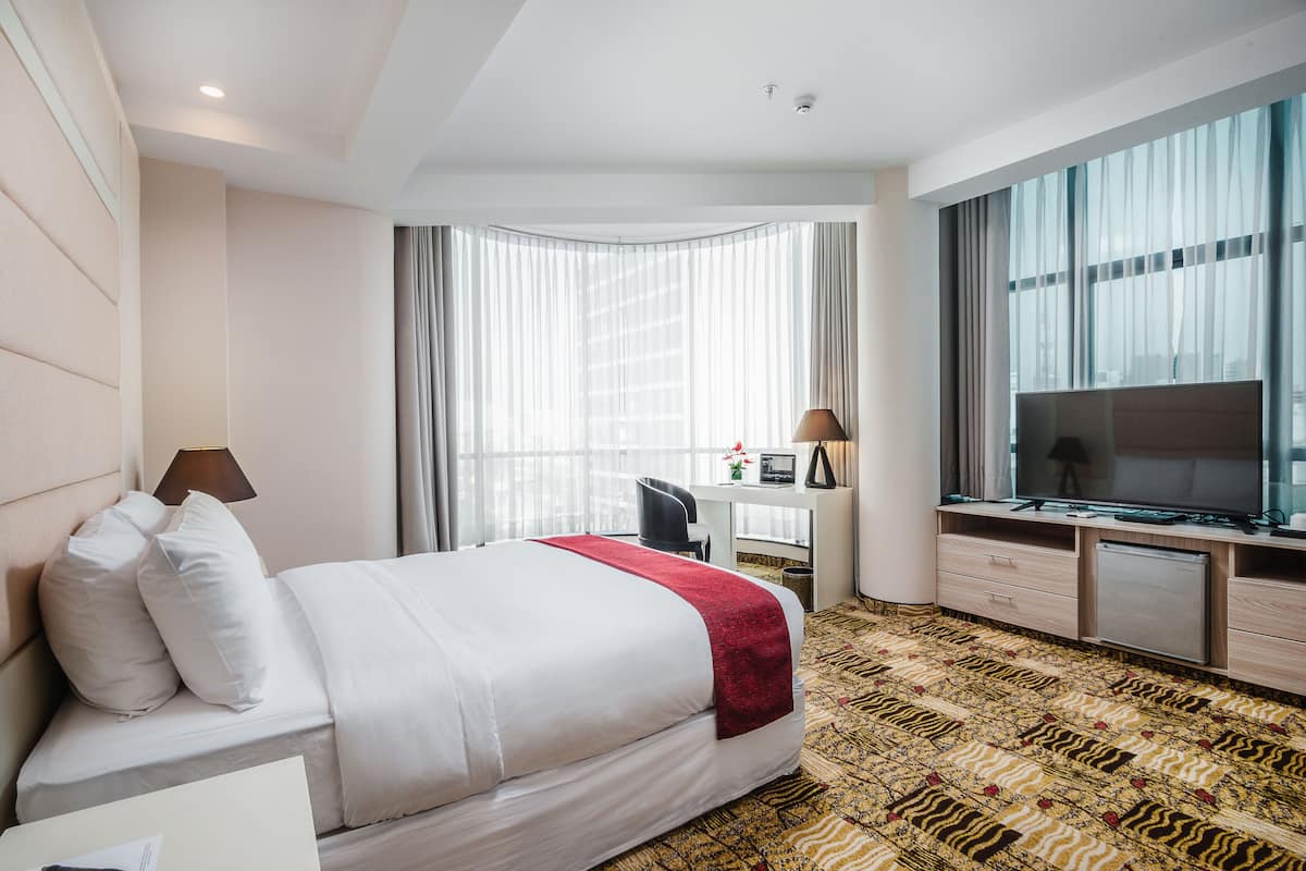 Quarto superior | Roupas de cama premium, frigobar, cofres nos quartos, escrivaninha