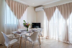 Suite, 2 Bedrooms, Kitchenette | Breakfast area | Daily local cuisine breakfast for a fee - Casa Leo (Playa del Carmen)