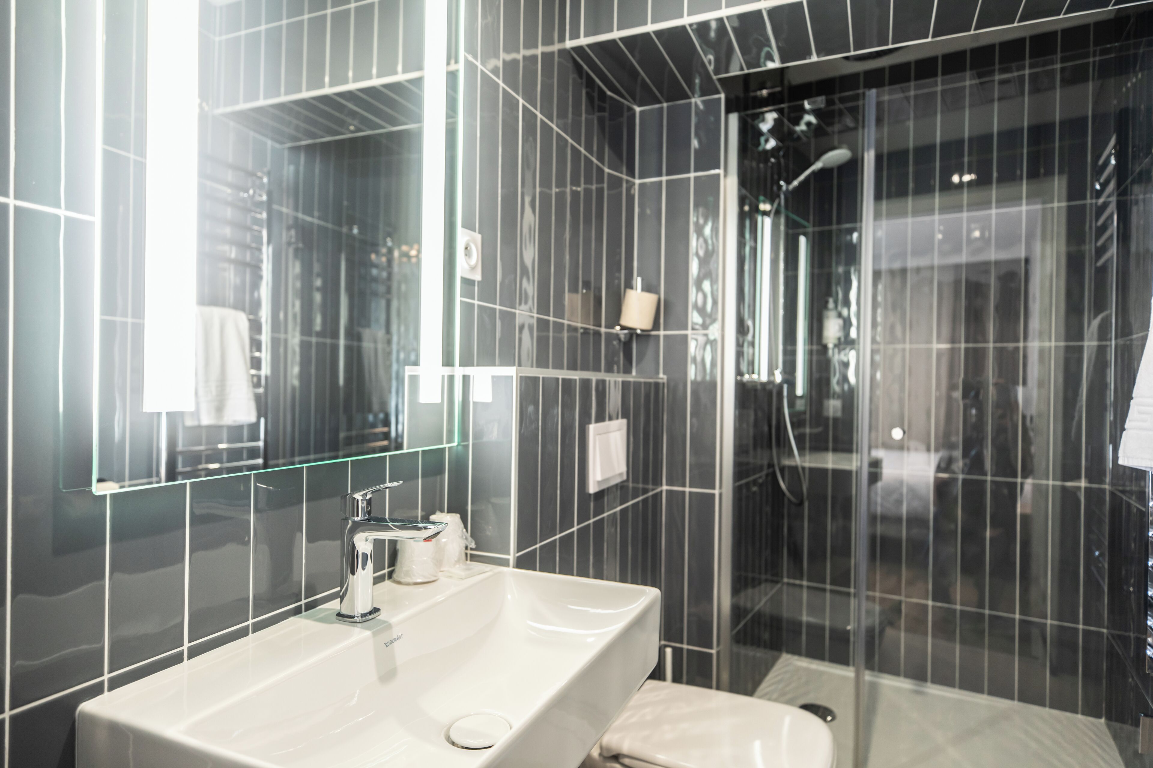 shower, free toiletries, hair dryer, towels