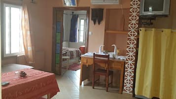 Standard Room | Living area | Flat-screen TV