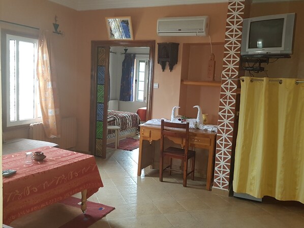 Standard Room | Living area | Flat-screen TV