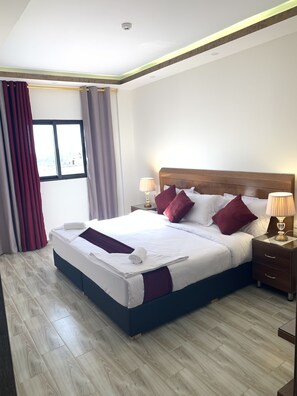 Double Room, 1 King Bed | Individually decorated, iron/ironing board, free cots/infant beds - Petra Sky Hotel (Wadi Musa)