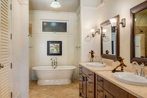 Bathtub, hair dryer, towels, soap