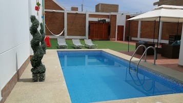 Outdoor pool, pool loungers