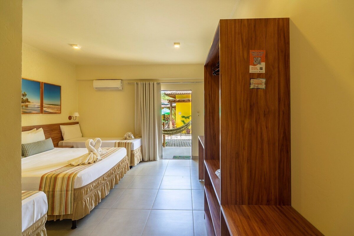 Triple Room (Suite) | Minibar, in-room safe, desk, laptop workspace