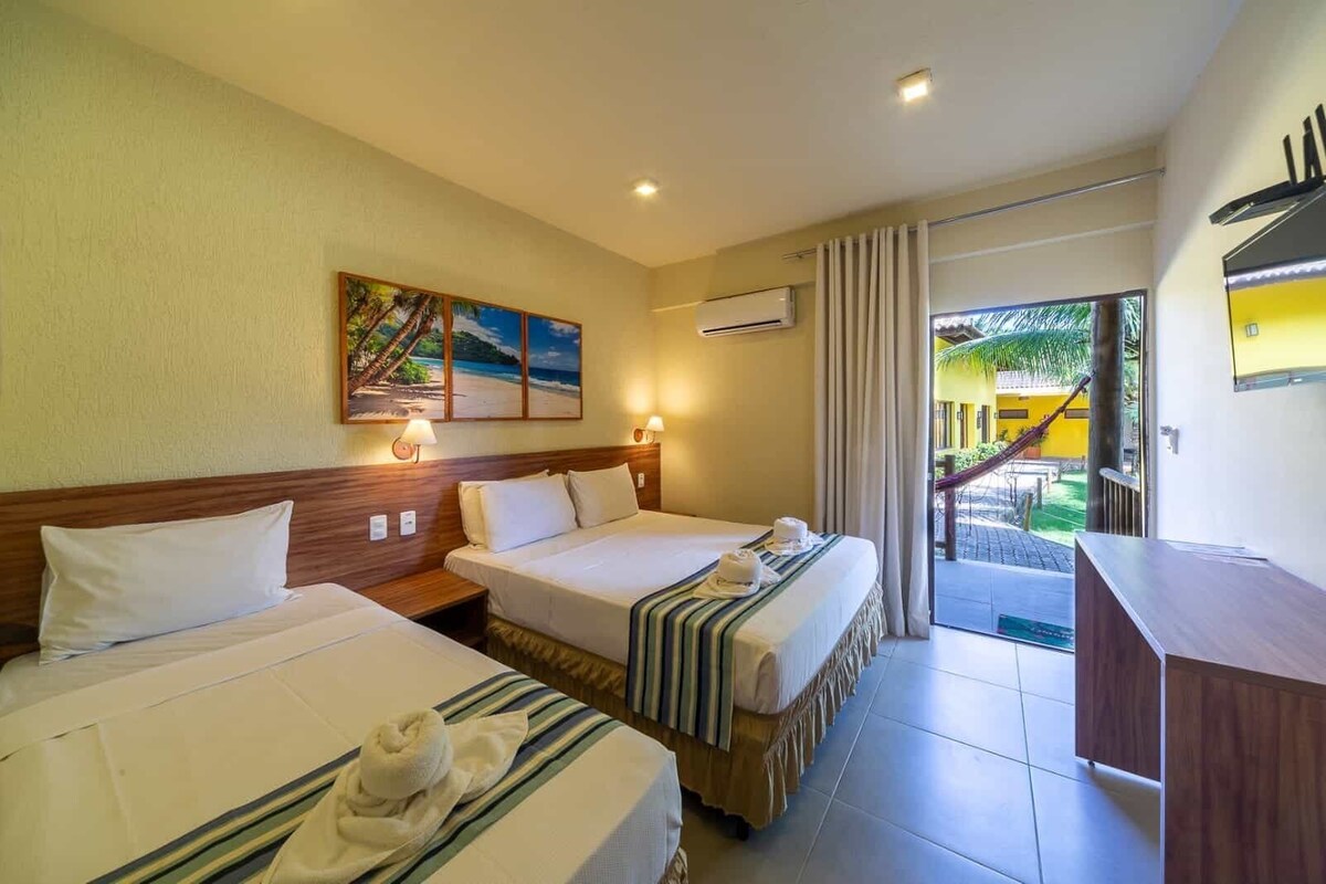 Family Quadruple Room (Suite) | Minibar, in-room safe, desk, laptop workspace