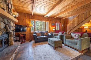 Smart TV, fireplace, DVD player, books