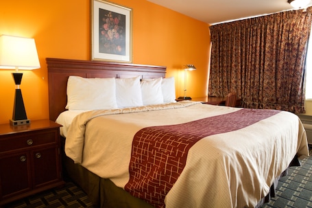 Economy Single Room, 1 King Bed, Non Smoking | Desk, free WiFi, bed sheets