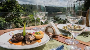Breakfast, lunch, dinner served; local cuisine