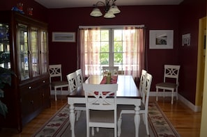 Dine in style with a traditional dining table and six comfortable chairs.