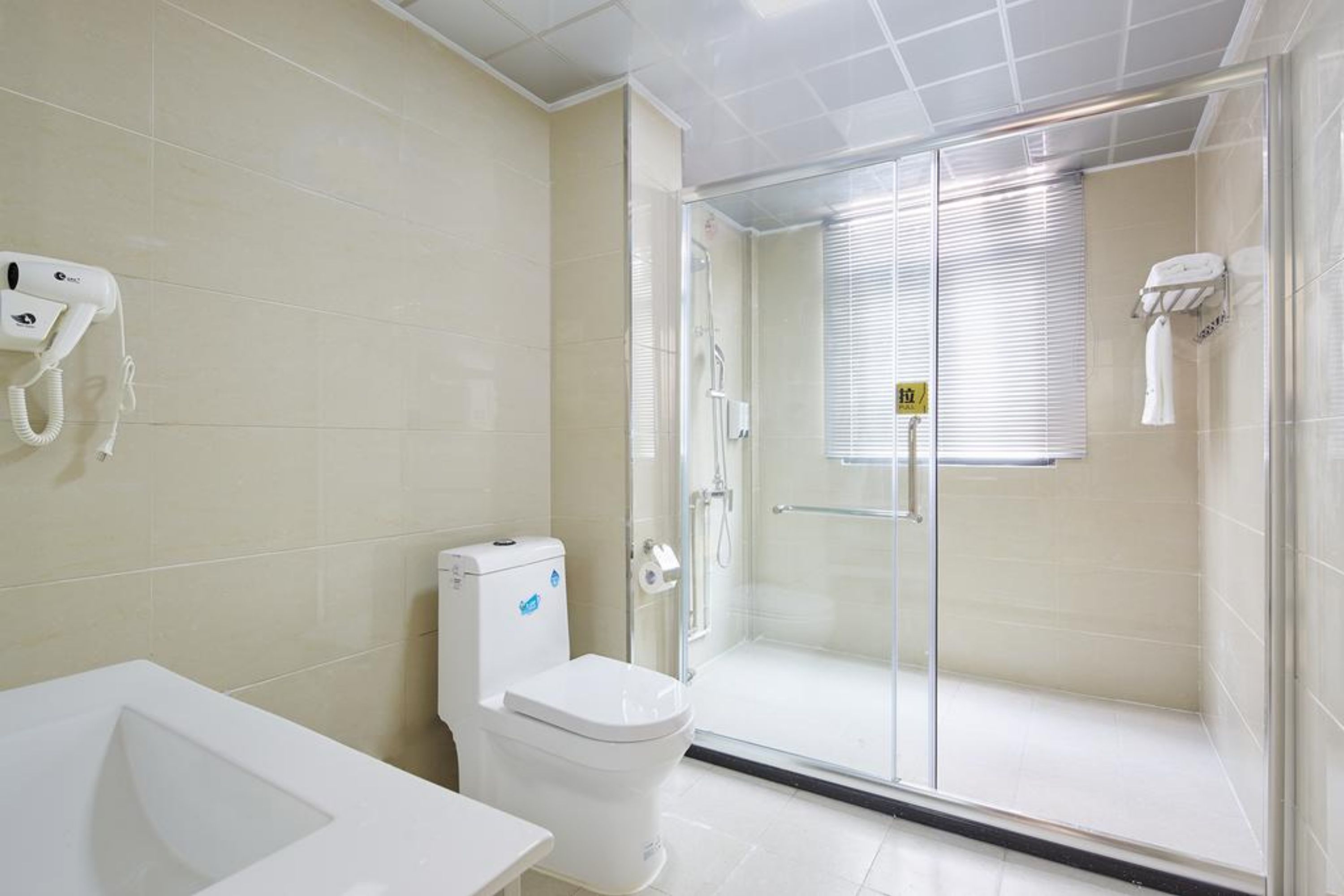 Shower, free toiletries, hair dryer, slippers