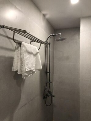 Shower, free toiletries, hair dryer, slippers