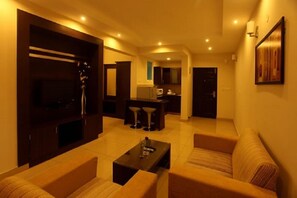 Executive Apartment, 1 Bedroom | Living area | Flat-screen TV - Nagarjuna Suites (Bengaluru)