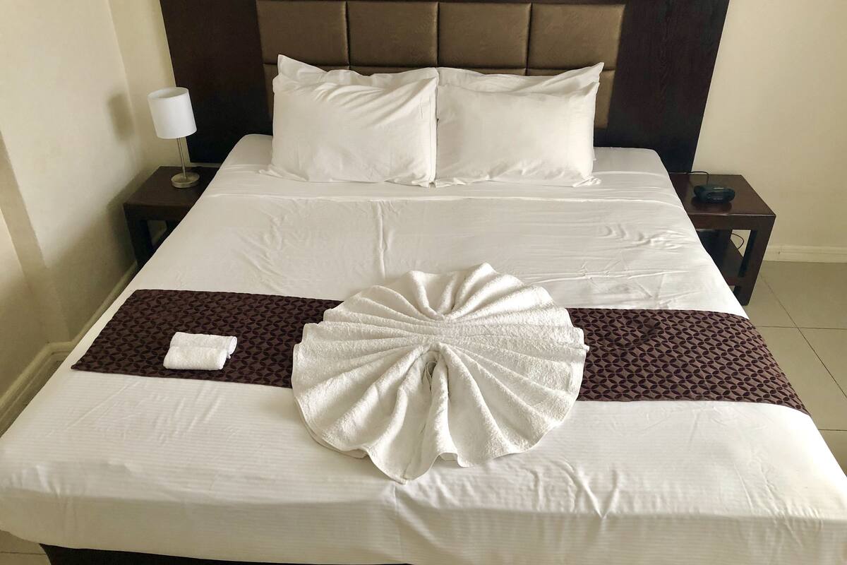 standard triple room | blackout curtains, bed sheets